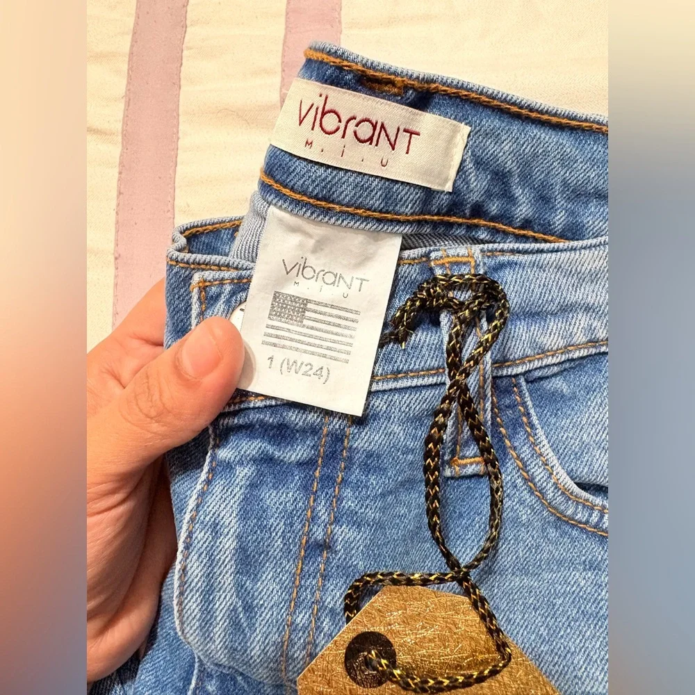Vibrant Women's Light Blue Ripped Skinny Jeans - Picture 2 of 4